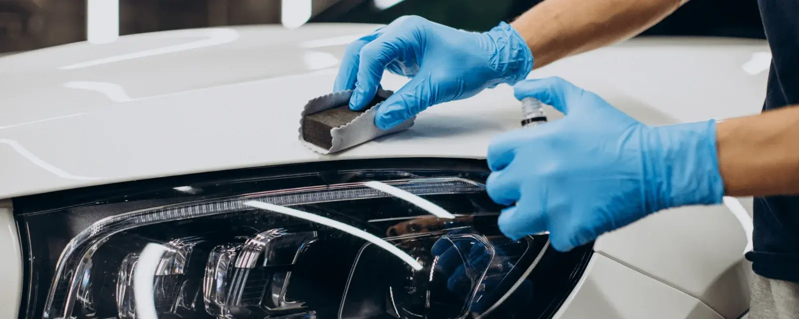 man-working-car-detailing-coating-car.png.webp